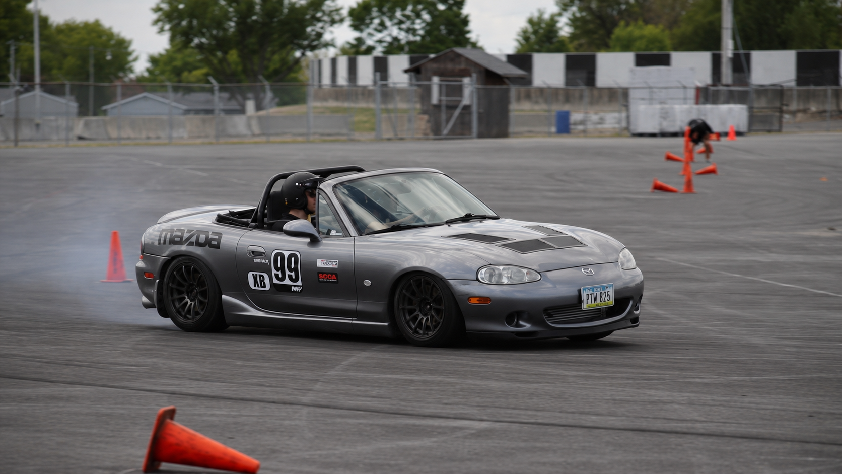 Marcussen Motorsports Miata rotating through an autocross corner